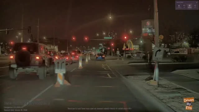 Tesla FSD Spots Illegal Pedestrian Crossing in Harsh Lighting