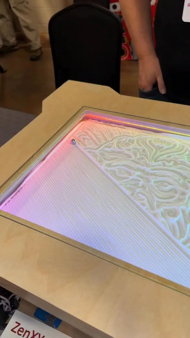 Zen Table Hides a 2D Printer Gantry