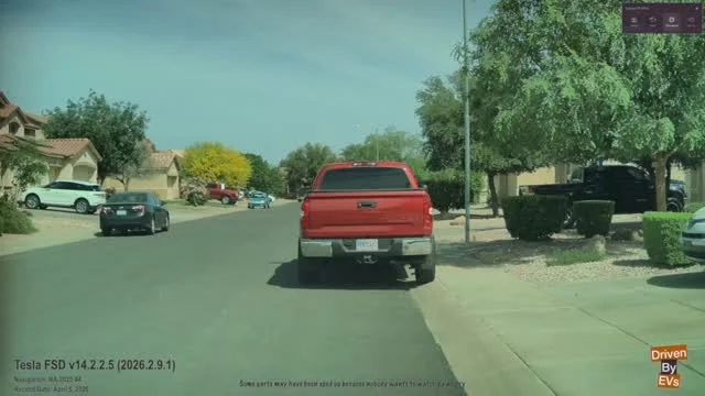 Tesla FSD Reverses to Create Space for Driver