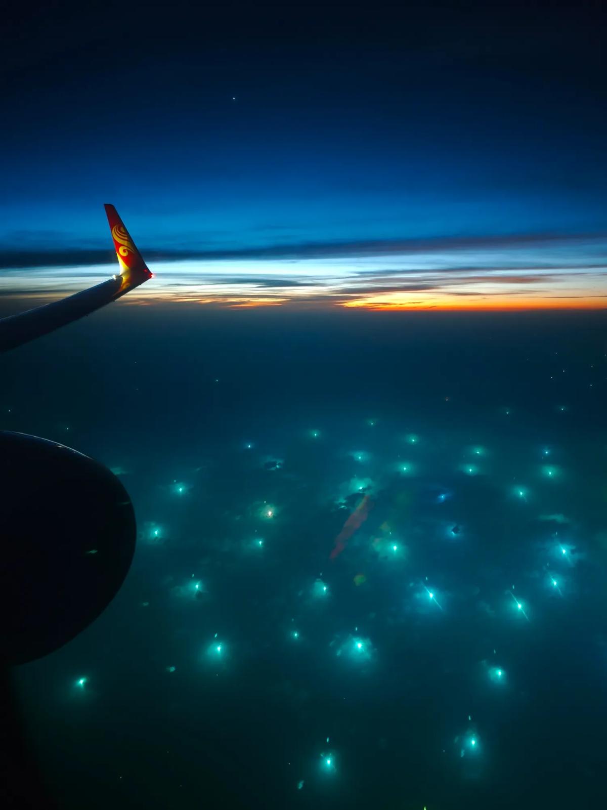 Night Flight Reveals Ocean Sparkling Like a Galaxy