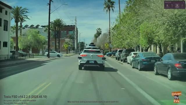 Tesla FSD Cautiously Monitors Pedestrians, Causing Ambiguous Hesitation