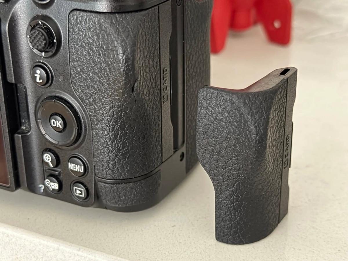 Replacing Nikon Z6III Battery Door Requires Full Back Removal